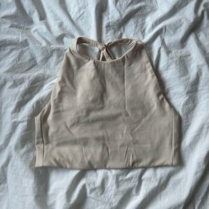 Girlfriend Collective pale pink high neck sports bra